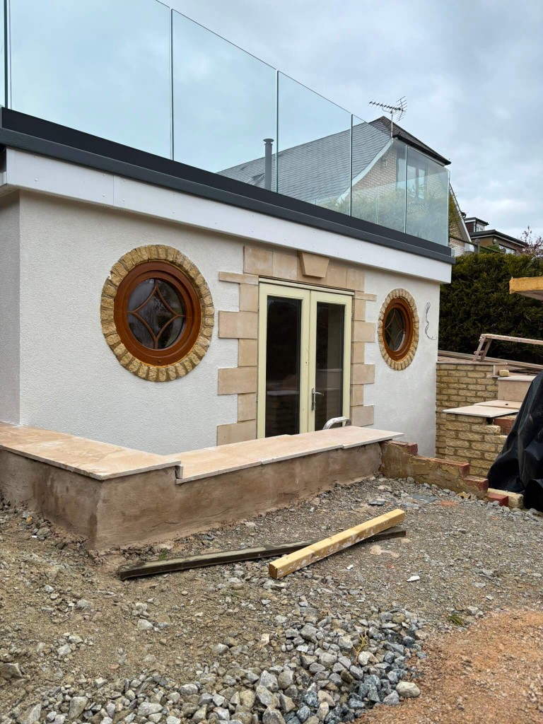 External rendering with stone detailing on a modern extension in Kent